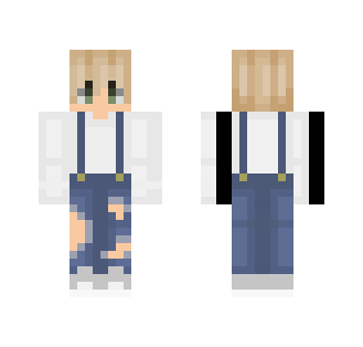 Blonde boy in overalls